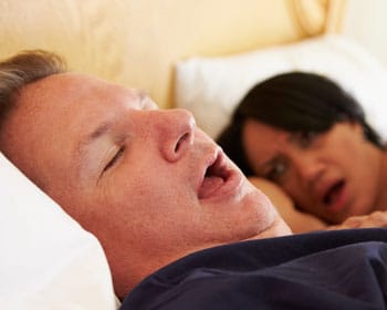 man-with-sleep-apnea-350